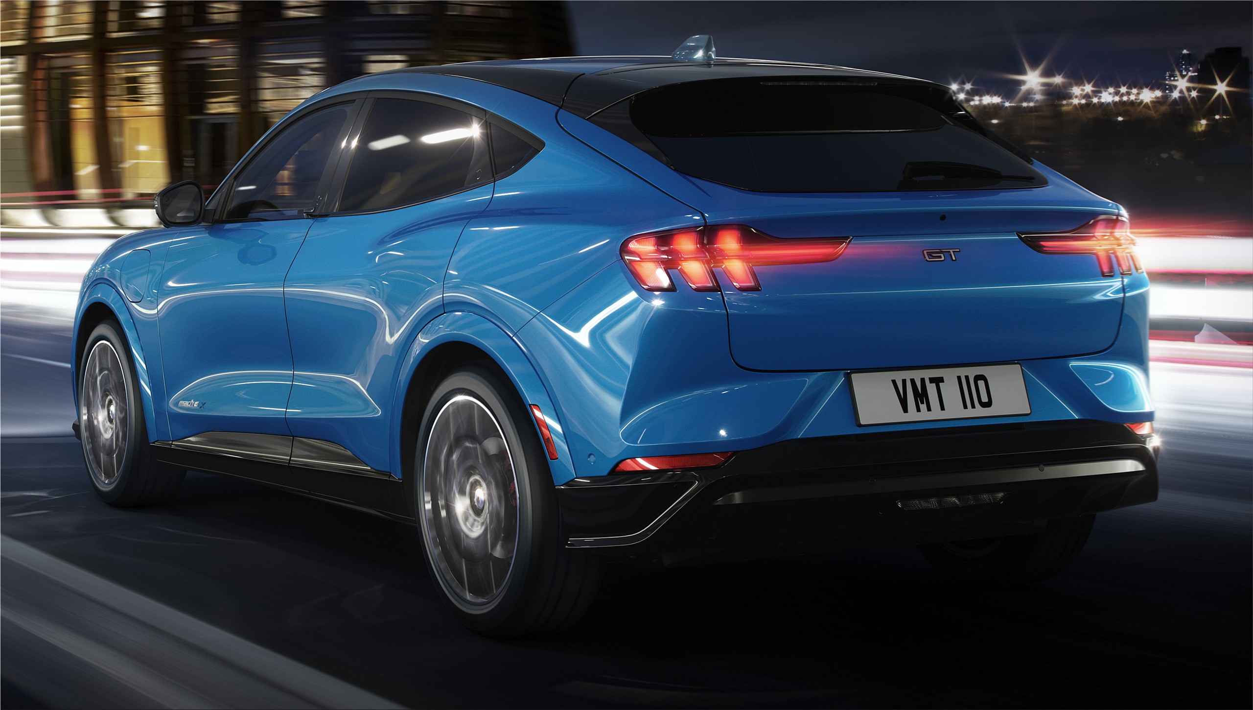 The 2022 Ford Mustang Mach E all electric SUV driving The 2022 Ford Mustang Mach E all electric SUV driving
